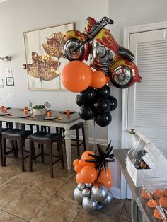 a motorcycle themed birthday party with balloons