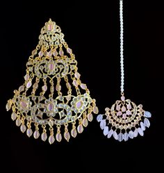 Jadavi lacha with satlada and jhoomar tika made using cz stones with gold plating shell pearls used natural rose quartz beads used Handmade Chandbali Bollywood Tikka, Handmade Bollywood Chandbali Tikka, Ceremonial Chandbali Tikka With Stone Work, Pink Kundan Chandbalis For Eid, Elegant Pink Chandbalis With Tilla Detail, Handmade Pink Chandbali Kundan Necklace, Pink Kundan Chandbalis With Tilla, Handmade Kundan Chandbalis For Wedding, Ceremonial Chandbali Stone Work Tikka