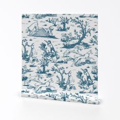 a blue and white toiler pattern on a wallpapered background with animals