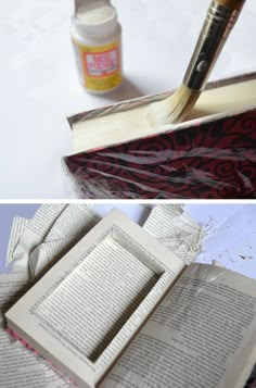 an open book sitting on top of a table next to a pen and ink bottle