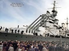 a large group of people standing on top of a ship