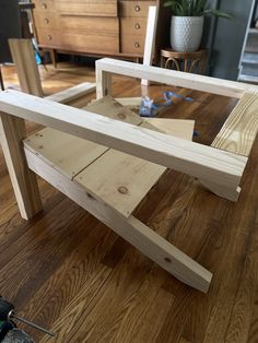 a wooden table is being constructed with plywood