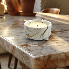 a marble table with a candle on it