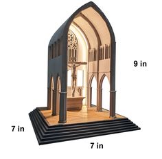 an image of a model of a church with the doors open and steps up to it