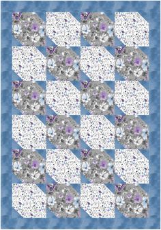 a blue and white checkerboard quilt with purple flowers on the bottom, in front of