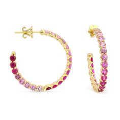 Discover the epitome of luxury and elegance with Stevie Wren's fine jewelry collection, featuring The Idol 18K Gemstone Hoops. Crafted with precision in 18K solid gold, these hoops showcase a breathtaking ombre display of gemstones totaling 5.46 carats. Each stone is a full-cut round stone, meticulously prong-set to enhance its brilliance and beauty.The unique peek-a-boo design of these hoops adds a playful touch to the colorful array of stones, making them a statement piece for any occasion. Wi Boo Design, Aa Jewelry, Rainbow Gemstones, White Gold Sapphire, Red Ombre, The Idol, Rose Gold Pink, Pink Ombre, Fine Jewelry Collection