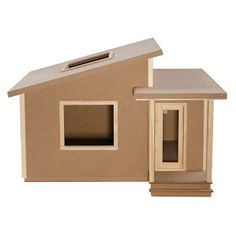 a cardboard house with a solar panel on the roof and one window open to let in light