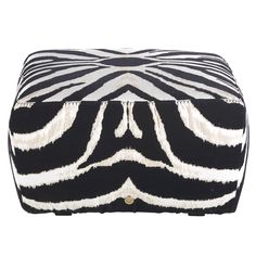 a black and white zebra print ottoman