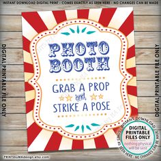 a photo booth sign with the words grab a prop and strike a pose on it