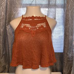 Super Cute Cami. Amber/Rust Color. New With Tags. See Through As Shown In Pictures Casual Open Knit Tank Top For Fall, Trendy Knit Crop Top For Spring, Casual Open Knit Stretch Crop Top, Casual Stretch Crop Top With Open Knit, Casual Cropped Open Knit Top, Casual Stretch Open Knit Crop Top, Casual Fall Crop Top For Vacation, Casual Brown Open Knit Top, Casual Cropped Crochet Top With Knit Fabrication