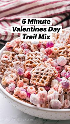 valentine's day trail mix in a white bowl with text overlay that reads valentine's day trail mix