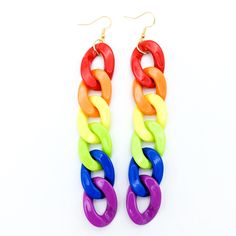 Rainbow chunky chains make fun and swingy earrings! These earrings are made from acrylic links: red, orange, yellow, green, blue, and violet. They are fun and trendy, light, and easy to wear. The earrings are long, slightly over 4 inches, and hang from silver-colored ear wires. These stunning earrings are sure to garner compliments! NOTE: If you would like latch-back or clip-on findings instead of the ear wires, just leave me a note when you order. I am happy to change them out before shipping. Cute Multicolor Plastic Earrings, Fun Multicolor Plastic Jewelry, Fun Rainbow Plastic Jewelry, Multicolor Plastic Chain Jewelry, Playful Multicolor Plastic Earrings, Gay Jewelry, Gay Pride Flag, Pride Jewellery, Plastic Earrings