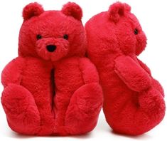 two red teddy bears sitting next to each other