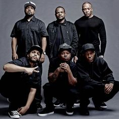 a group of young men posing for a photo with the caption ice cube, e gary gray, dr dre