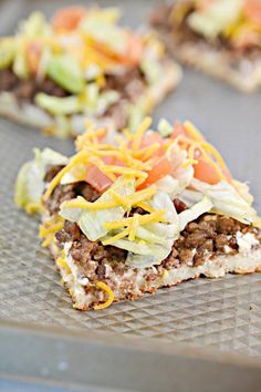 some food is sitting on a baking sheet