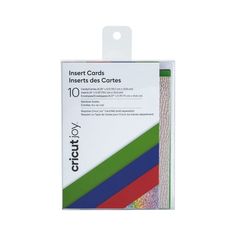 an assortment of different colored cards on a white background with the packaging in front of it