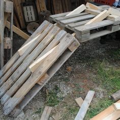 several pieces of wood sitting on the ground