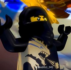 a lego man wearing a black ninja suit