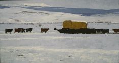 a herd of cattle walking across a snow covered field