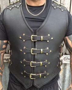 Mens Motorbike Black Thick Leather Braided Vest Up to 3MM Thick Leather Black Braiding at the front and back Golden Buckles  Golden Reverts  Buy This Product With confidence We have a 14 Days Return Policy Masc Fashion, Leather Biker Vest, Biker Vest, Leather Armor, Leather Art, Real Leather Jacket, Mens Vests, Biker Leather, Leather Projects