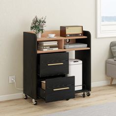 an office desk with three drawers in front of a chair and a window behind it