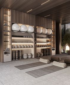 a room filled with lots of white plates and bowls on shelves next to each other