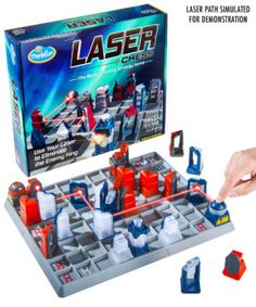 the laser chess board game is being played by someone's hand and has several pieces in it