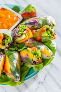 lettuce wrapped in tortilla wrap with dipping sauce