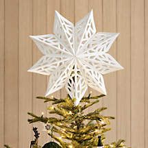 a christmas tree with a white star on top