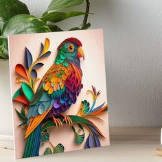 a colorful bird sitting on top of a wooden table next to a potted plant