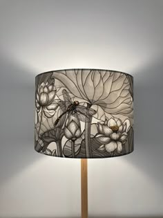 a lamp that has a dragonfly on it