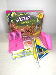 the barbie beach fun set is in its original box and includes accessories like umbrellas