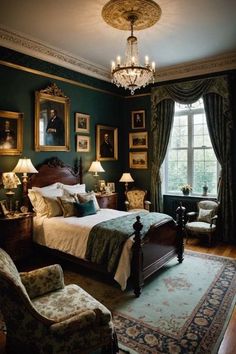 a bedroom with green walls and pictures on the wall, along with a chandelier