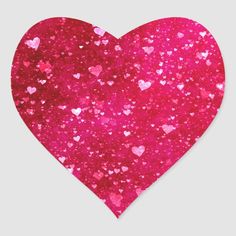 a pink heart shaped glitter sticker on a white background with lots of small hearts