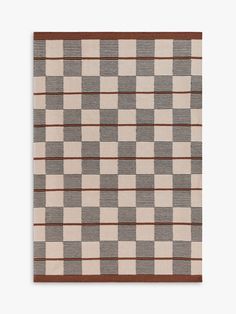 a brown and white checkered area rug