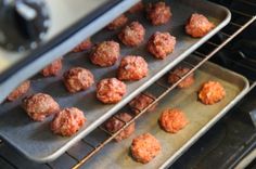 the meatballs are being cooked in the oven