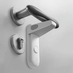 an electronic device mounted to the wall with two handles and one handle on it's side