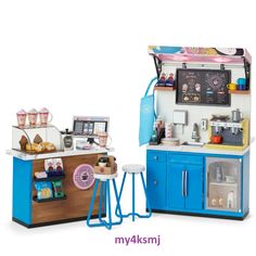 the toy kitchen is set up to look like an ice cream parlor and coffee shop