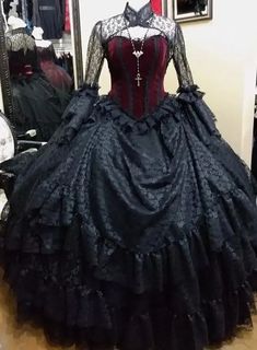 Gothic Black Wedding Dresses Lace Long Sleeve Floor Length Lace-up Bridal Gowns.  "This pin contains affiliate links, which means I may earn a commission at no cost to you extra for you". 
#affiliate #advertising" Floor-length Black Corset Dress For Wedding, Gothic Ball Gown For Wedding, Black Fitted Ball Gown With Ruffles, Fitted Black Ball Gown For Costume Party, Black Fitted Ruffle Ball Gown, Fitted Black Ball Gown With Ruffles, Black Full-length Wedding Dress, Black Full Length Wedding Dress, Black Ruffled Dress For Debutante Ball