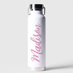 a white water bottle with pink lettering on it