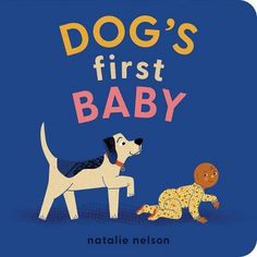 dog's first baby book with an image of a puppy playing with another dog