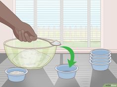 a person mixing ingredients in a bowl on top of a table with bowls and spoons