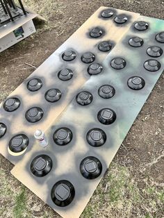 two stove top burners sitting on the ground