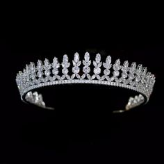 CZ%20Bridal%20and%20Quince%20Tiara%0D%0AThis%20dazzling%20cz%20tiara%20will%20add%20a%20regal%20look%20to%20your%20wedding%20or%20quinceanera%20day%20ensemble.%20This%20glamorous%20headpiece%20features%20high%20quality%20marquise%20and%20round%20cz%26nbsp%3Bcrystals%20in%20a%20silver%20plated%20vintage%20inspired%20design.%0D%0AColor%3A%20Silver%2FClear.%0D%0AStyle%3A%20hp7677.%0D%0ASize%3A%20Design%20is%20about%26nbsp%3B%201%201%2F4%22%20tall.%0D%0APlease%20allow%202-3%20weeks%20for%20delivery.%0D%0AShipping%20Policy.%0D%0AReturn%20Policy%0D%0A%26nbsp%3B%0D%0A%26nbsp%3B%0D%0A%26nbsp%3B Prom Tiaras, Quinceanera Tiaras, Vintage Tiara, Silver Head Piece, Chic Headband, Crystal Bridal Tiaras, Silver Tiara, Crystal Tiara, Beautiful Tiaras