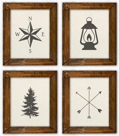 four framed pictures with different types of compasss and pine trees in wooden frames on the wall