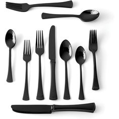 an assortment of black utensils and spoons