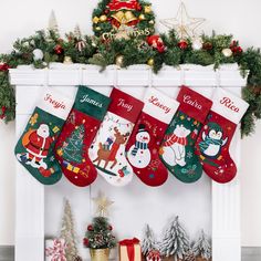 christmas stockings hanging from a fireplace mantel