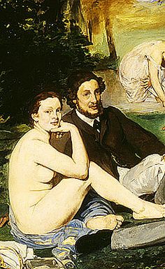 two men and a woman sitting on the ground