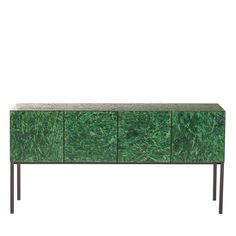 the sideboard is made out of wood and has green moss growing on it's sides