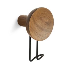 a wooden and metal object on a white background